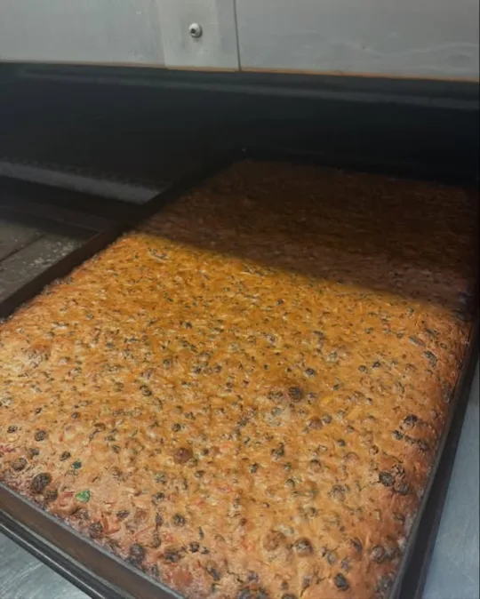 A full tray of fruitcake fresh from the oven